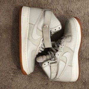 High top Nike cream snake skin Air Force 1s